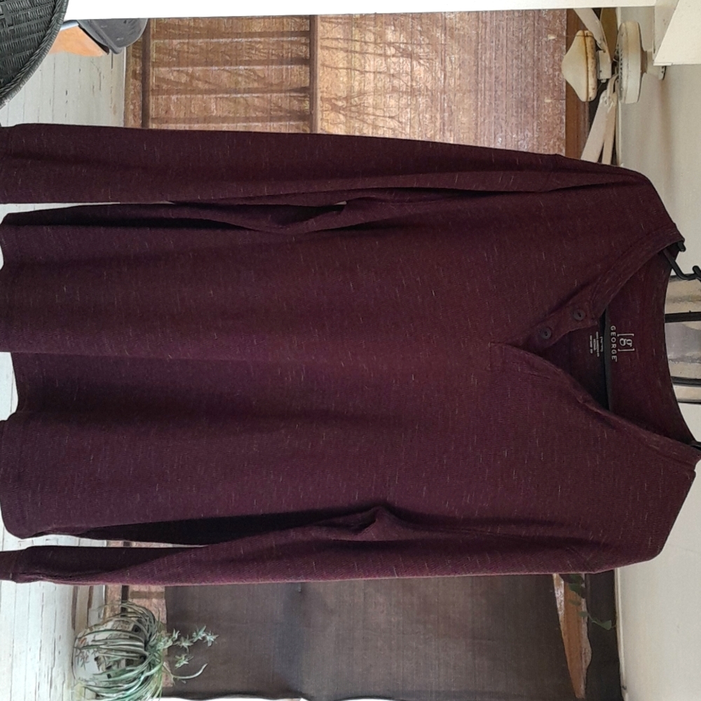 Long sleeve Henley shirt.